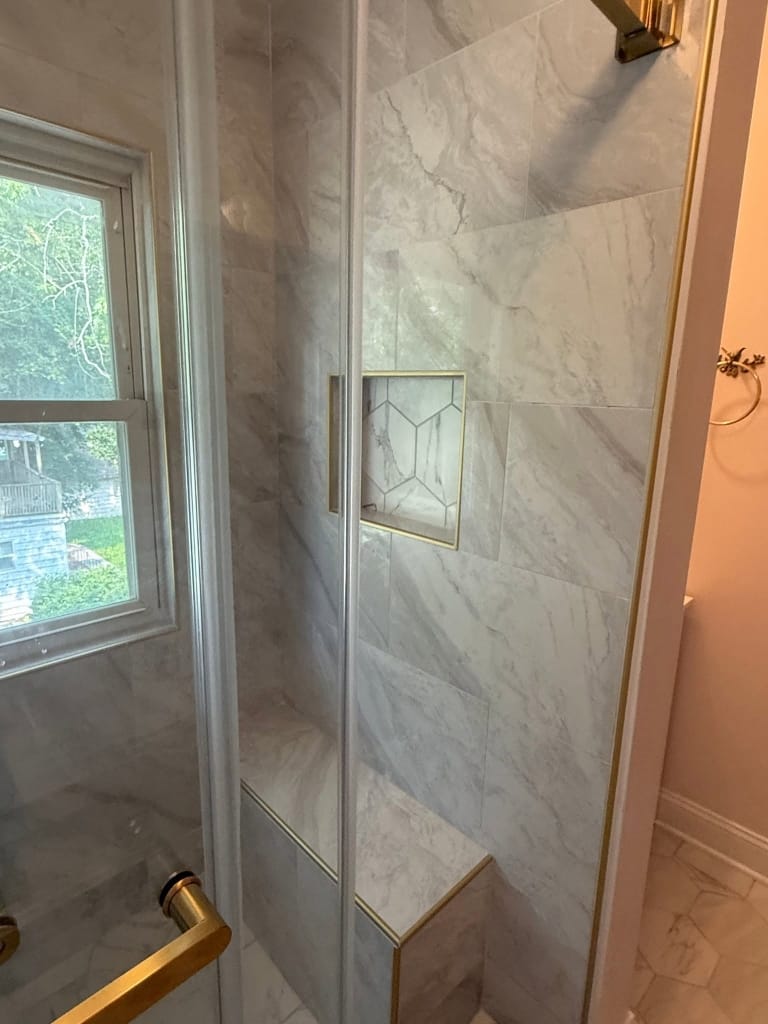 Recessed Hexagonal Shampoo Niche with Gold Accent Trim
