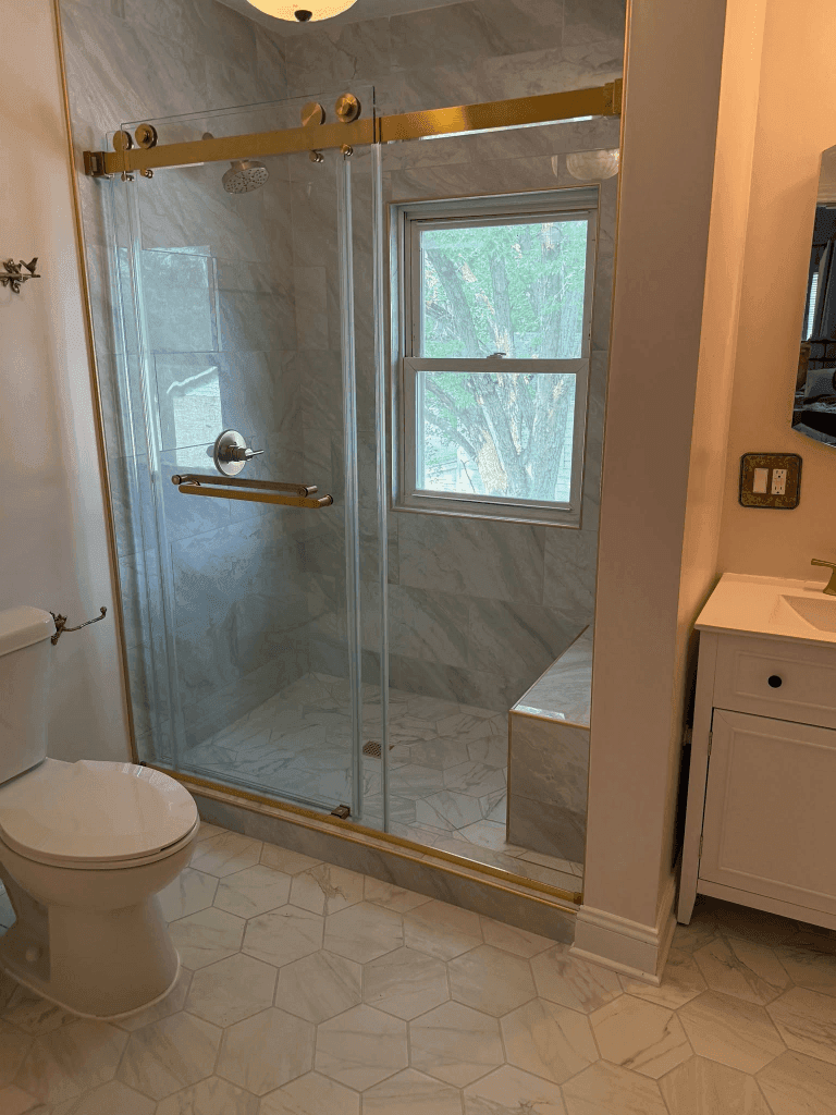 Frameless Sliding Shower Enclosure with Brushed Gold Hardware
