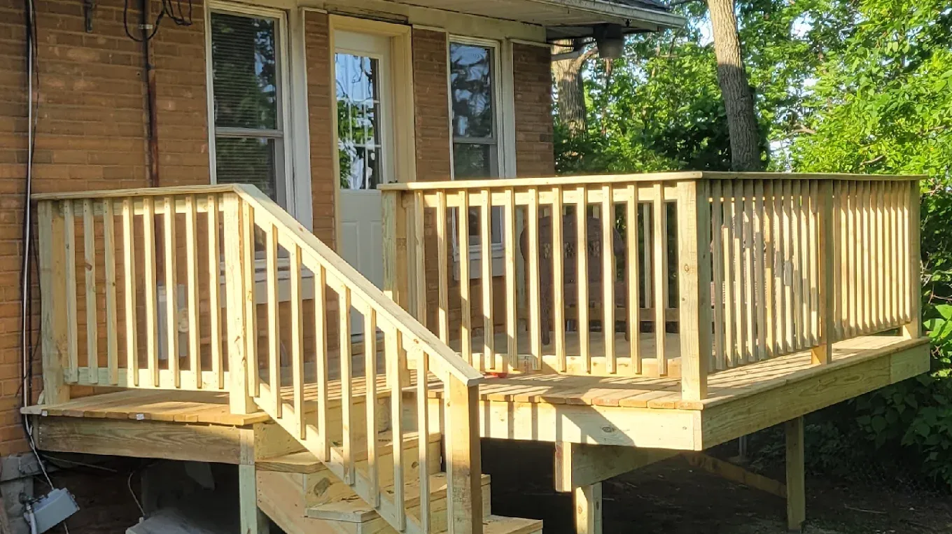 Exterior Landing & Entry Staircase with Wood Railings